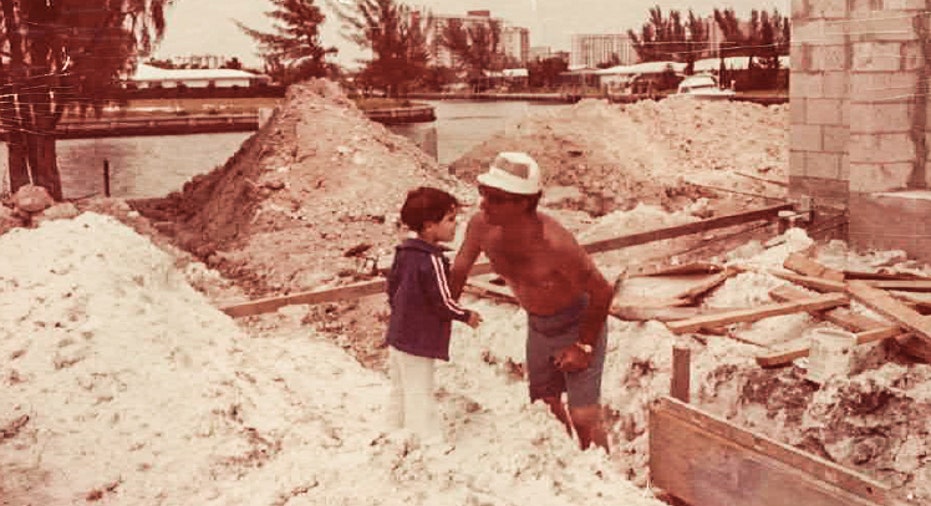 Troy Ippolito as child building home