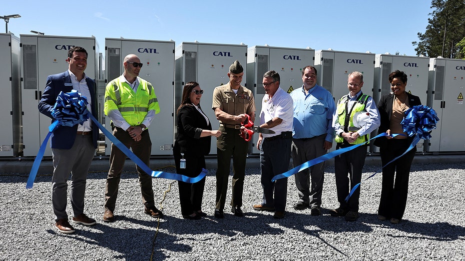 A ribbon cutting ceremony at the green energy project at Camp Lejeune