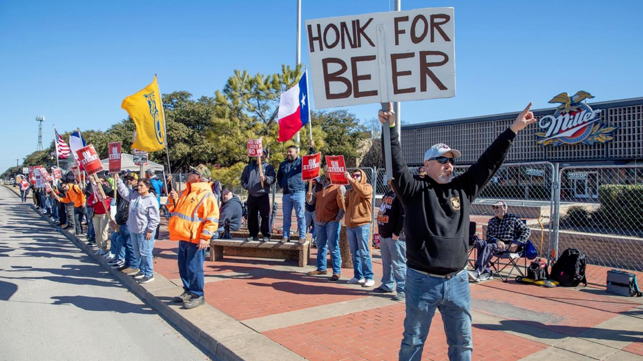 Molson Coors employees picketing outside facility