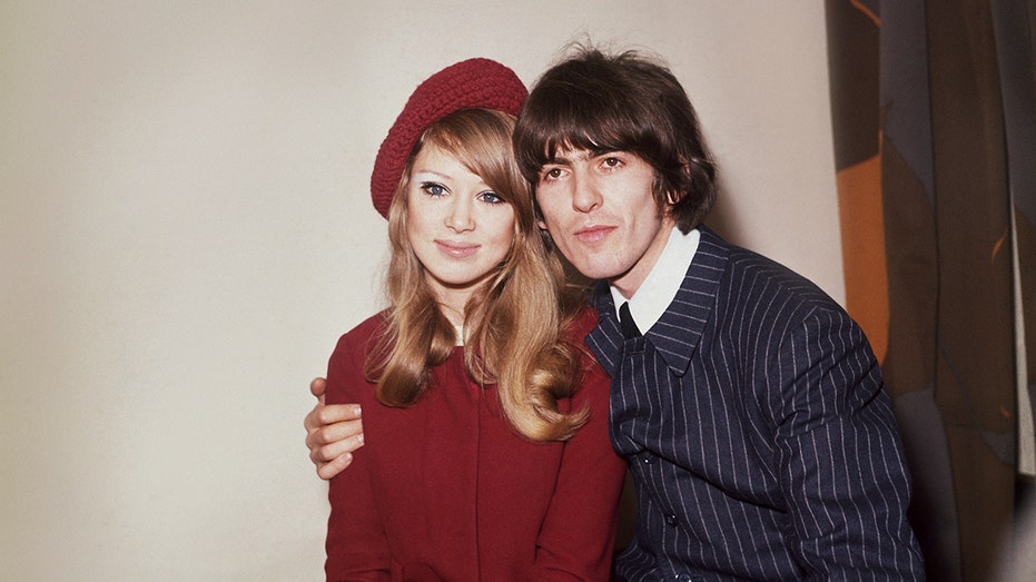 Pattie Boyd and George Harrison pose for a photo