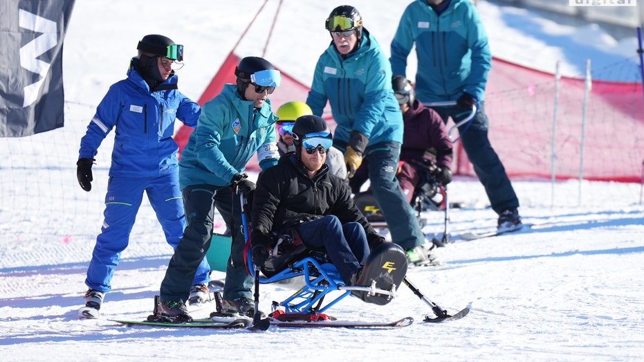 Prince Harry learning a winter sport