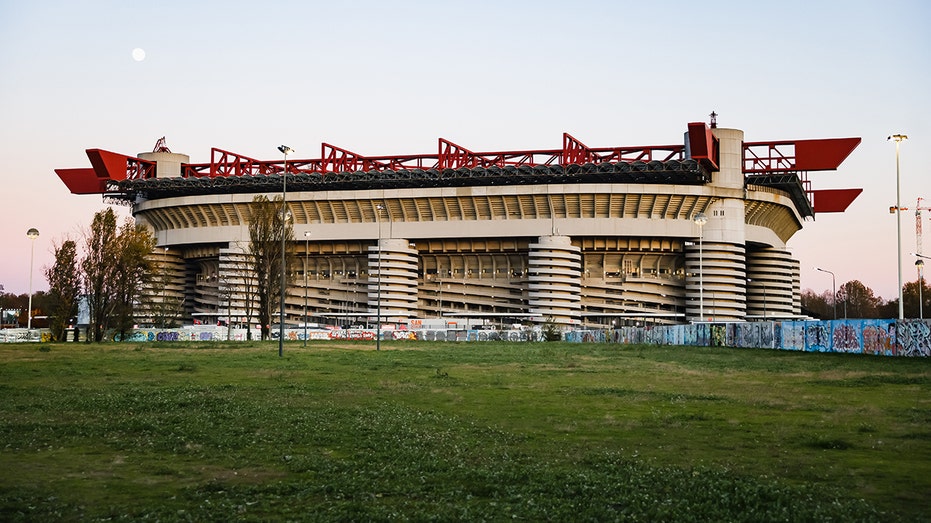 Exterior shot of San Siro stadium in Milan showing the grass in front of the building