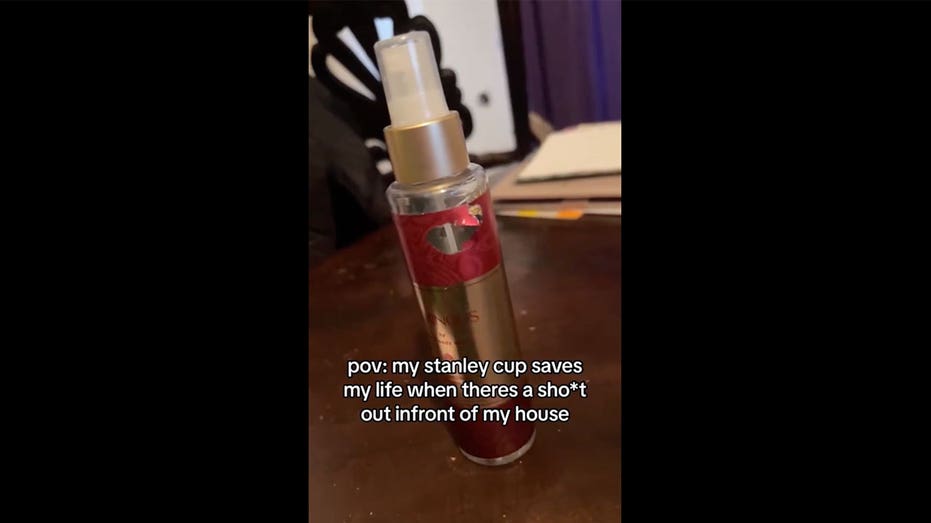Perfume bottle hit by bullet