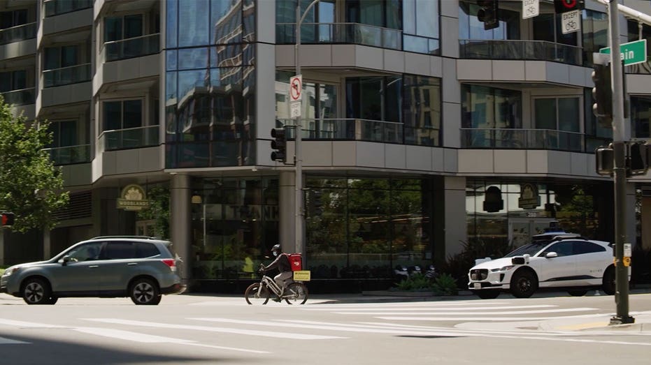 Waymo near San Fran bicyclist