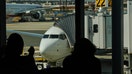 Travelers wait to board a Boeing 737 MAX 8 plane operated by United Airlines at Newark Liberty International Airport (EWR) in Newark, New Jersey, US, on Wednesday, March 13, 2024. The TSA expects travel volumes during the peak spring break travel season at nearly 6% above 2023. Photographer: Bing Guan/Bloomberg via Getty Images