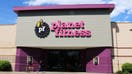 Planet Fitness health center entrance showing company logo above doors. (Photo by: Don and Melinda Crawford/UCG/Universal Images Group via Getty Images)