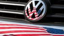 An archive picture of a US-flag that is being reflected in a Volkswagen car front in Chattanooga, US, 15 May 2009.