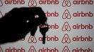 ANKARA, TURKIYE - NOVEMBER 22: In this photo illustration, a key is seen in front of a computer screen displaying the Airbnb logo in Ankara, Turkiye on November 22, 2023. (Photo by Dilara Irem Sancar/Anadolu via Getty Images)