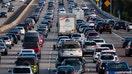 SAN DIEGO, CALIFORNIA - MARCH 12: Commuters sit in traffic on southbound Interstate 5 during the afternoon commute on March 12, 2024 in San Diego, California.  (Photo by Kevin Carter/Getty Images)