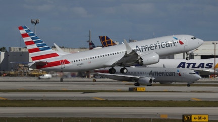 An American Airlines Boeing 737 Max takes off from Miami International Airport on Dec. 29, 2020 in Miami, Florida.