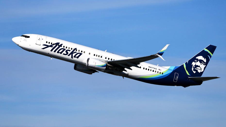 Alaska Airlines airplane takes off