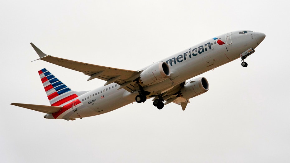 An American Airlines Boeing 737 Max takes off on a test flight from Dallas-Fort Worth International Airport in Dallas, Texas, on Dec. 2, 2020.