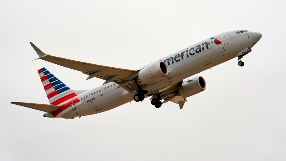 An American Airlines Boeing 737 Max takes off on a test flight from Dallas-Fort Worth International Airport in Dallas, Texas, on Dec. 2, 2020.