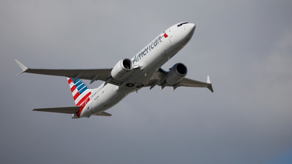 An American Airlines Boeing 737 takes off from Miami, Florida on December 29, 2020.