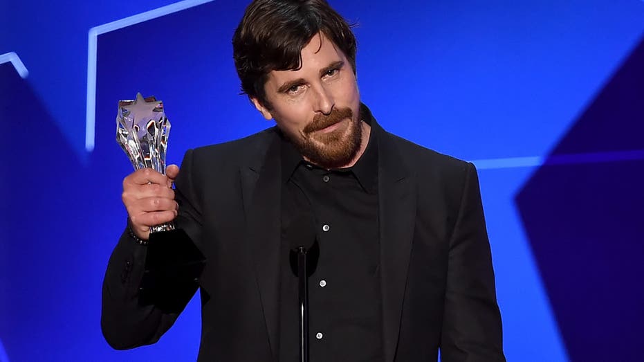 Christian Bale holds trophy at the 21st Annual Critics' Choice Awards