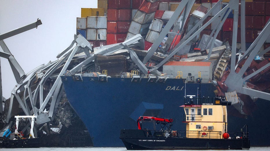 Dali cargo vessel stuck nether Baltimore bridge