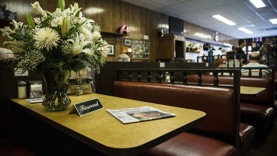 Soprano's booth with flowers on it