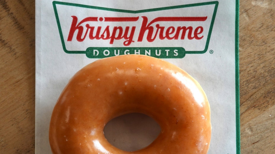 A Krispy Kreme glazed doughnut is shown connected May 12, 2022, successful Daly City, California.