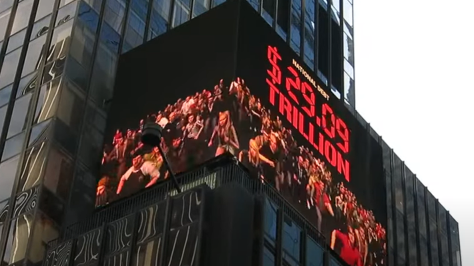 Billboard in NYC warning about national debt 