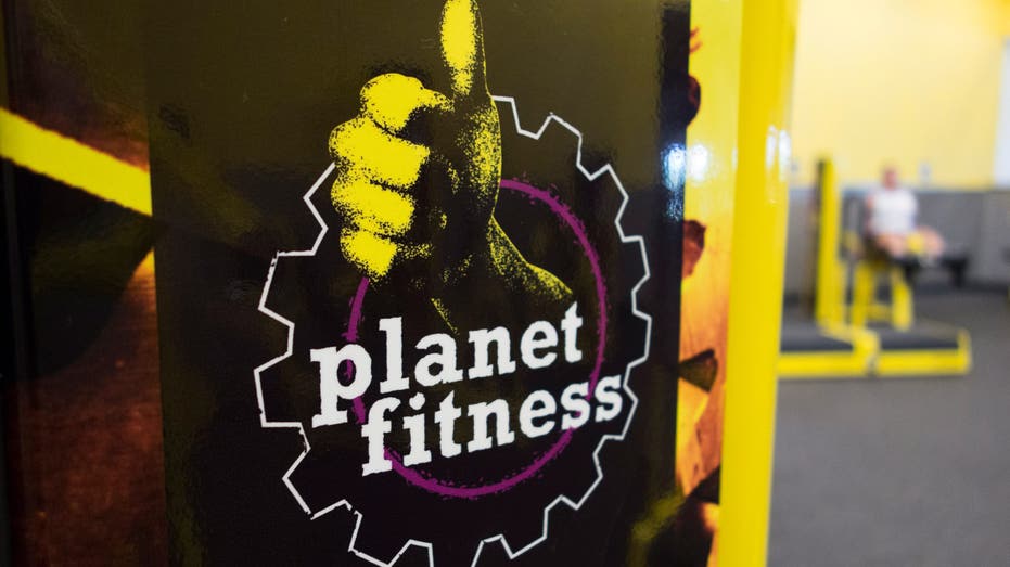 woman works out at Planet Fitness