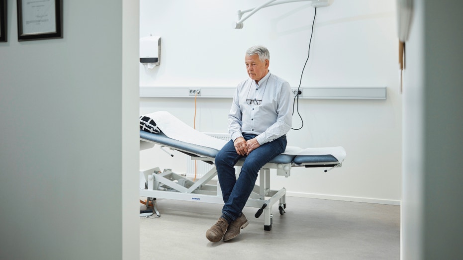 A patient waits in a room at a doctor's office.