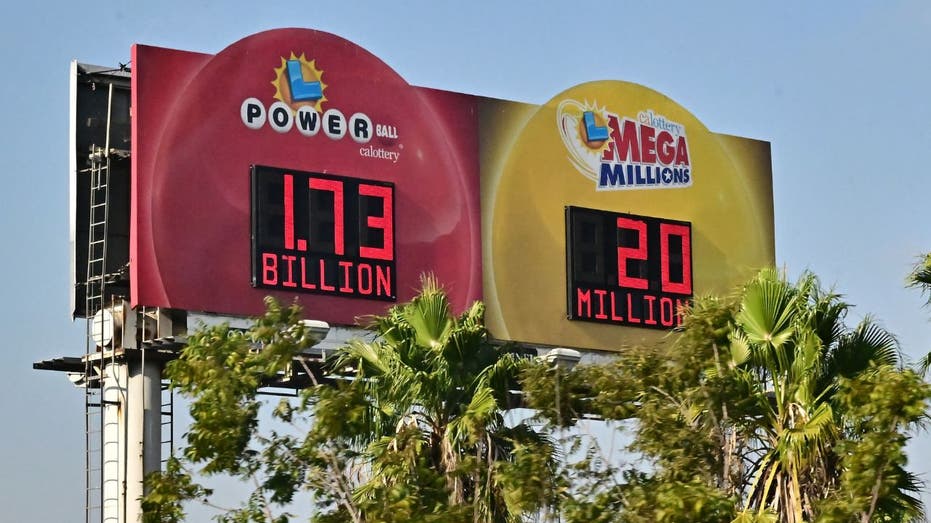 A billboard displaying Powerball and Mega Millions numbers