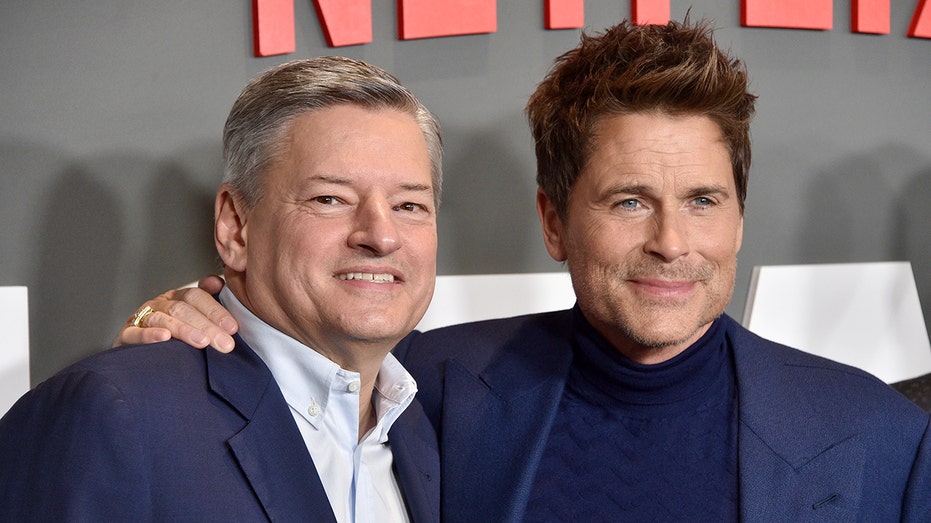 Ted Sarandos and Rob Lowe posing together