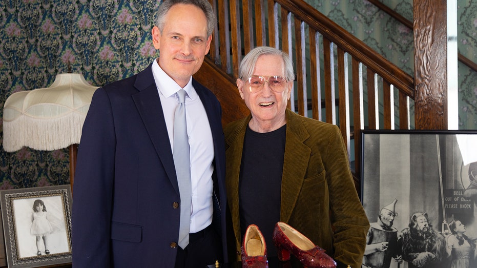 Michael Shaw with the ruby red slippers