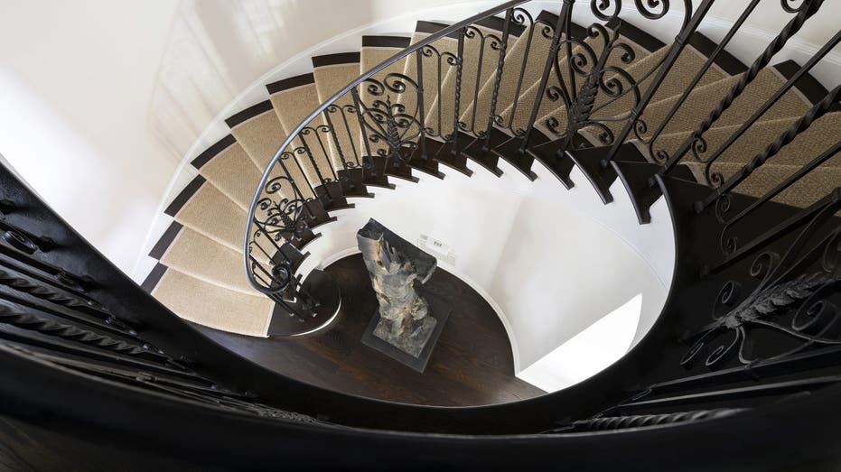 Picture of staircase cascading downwards in Judy Garland's old home