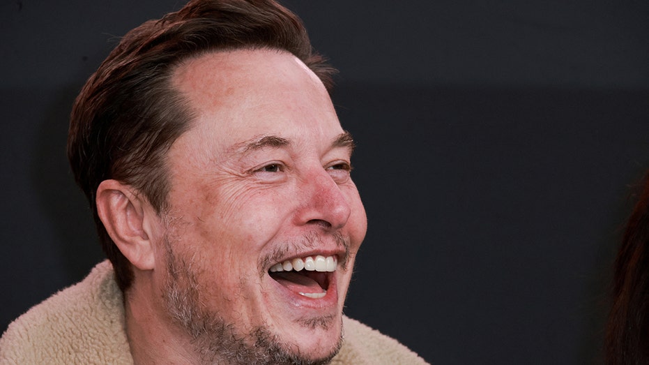 Elon Musk attends movie premiere