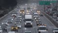 A truck travels along Interstate 80 on March 29, 2024 in Berkeley, California. The Environmental Protection Agency (EPA) has finalized a set of strict emissions standards for heavy-duty trucks, buses and other large vehicles in an effort to clean up some of the sources of greenhouse gases. The new rules will apply to model years 2027 through 2032 and will prevent nearly one billion tons of greenhouse gas emissions over the next thirty years. 