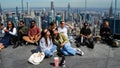 People look toward the sky at the 'Edge at Hudson Yards' observation deck ahead of a total solar eclipse across North America, in New York City on April 8, 2024. 