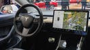 BRUSSELS, BELGIUM - JANUARY 09: Tesla Model 3 compact full electric car interior with a large touch screen on the dashboard on display at Brussels Expo on JANUARY 09, 2020 in Brussels, Belgium. The Model 3 is fitted with a full self-driving system. 