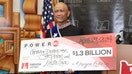 Cheng &ldquo;Charlie&rdquo; Saephan, his wife Duanpen and friend Laiza Chao scored the $1.3 billion Powerball windfall