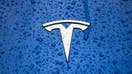 Tesla car emblem is seen with the raindrops on a car in Krakow, Poland on April 21st, 2024