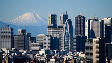 Mount Fuji and the Shinjuku skyline seen from an observation deck in Tokyo, Japan, on Tuesday, Dec. 26, 2023. Japan's industrial output in November is scheduled to be released by the Ministry of Economy, Trade and Industry on Dec. 28. Photographer: Akio Kon/Bloomberg via Getty Images
