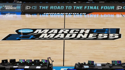 The March Madness logo shown on the floor before the Second Round NCAA Men's Basketball Tournament game between the Marquette Golden Eagles and the Colorado Buffaloes at Gainbridge Fieldhouse on March 24, 2024 in Indianapolis, Indiana. 