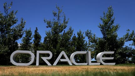 A sign is posted in front of Oracle headquarters on June 13, 2022 in Redwood Shores, California. Oracle reported fourth-quarter earnings with revenue of $11.8 billion, a 5 percent increase. 