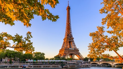(Google Flights) Paris, Eiffel Tower and river Seine at sunrise. Paris, France.