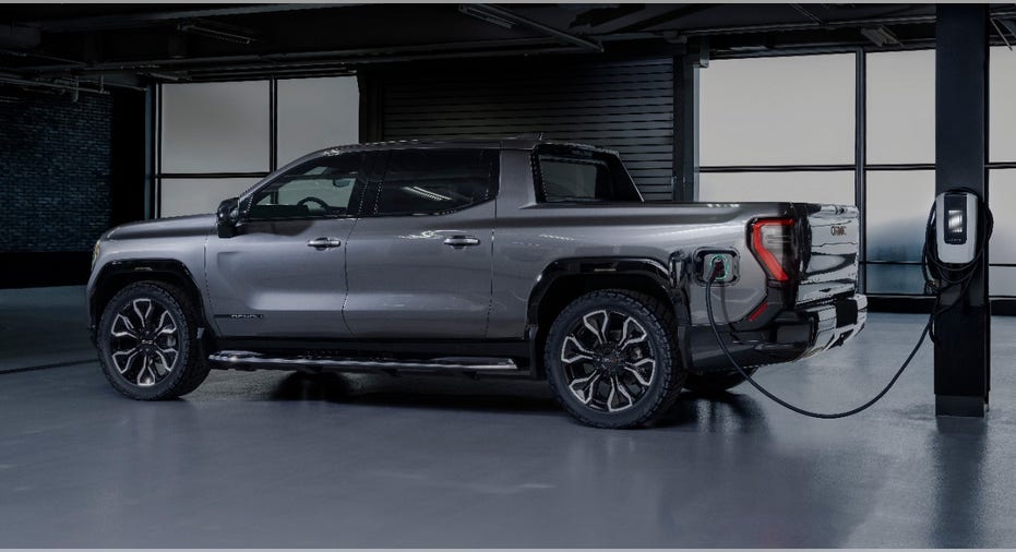 GMC Sierra EV Denali Edition 1 plugged in