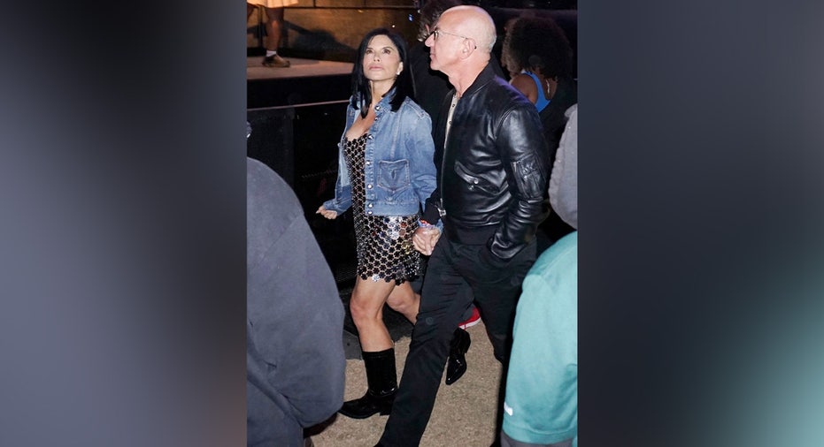 ONE TIME USAGE ONLY Jeff Bezos and fiancee Lauren Sanchez enjoys Tyler, The Creator's headlining set during the first weekend of the Coachella Valley Music and Arts Festival