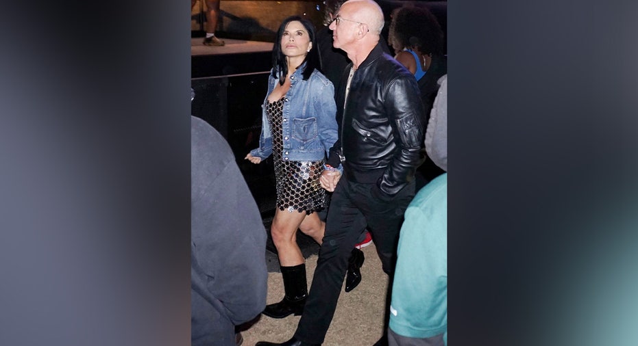 ONE TIME USAGE ONLY Jeff Bezos and fiancee Lauren Sanchez enjoys Tyler, The Creator's headlining set during the first weekend of the Coachella Valley Music and Arts Festival