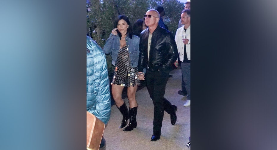 ONE TIME USAGE ONLY Jeff Bezos and fiancee Lauren Sanchez enjoys Tyler, The Creator's headlining set during the first weekend of the Coachella Valley Music and Arts Festival