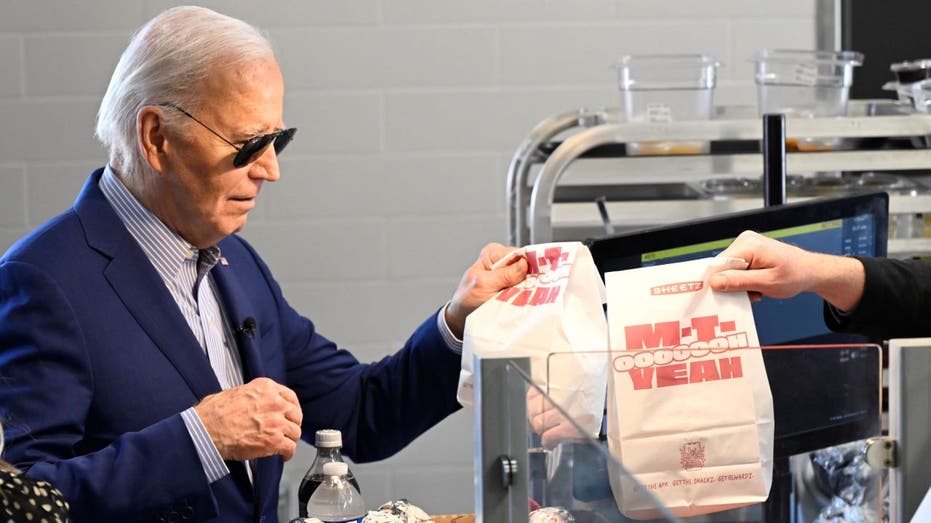 Biden holding Sheetz bag