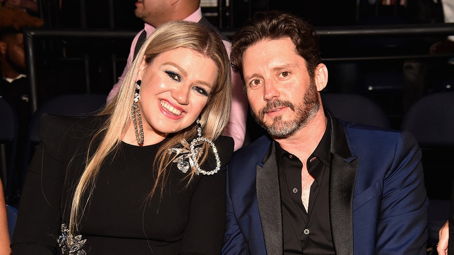 Kelly Clarkson and Brandon Blackstock attend an event together
