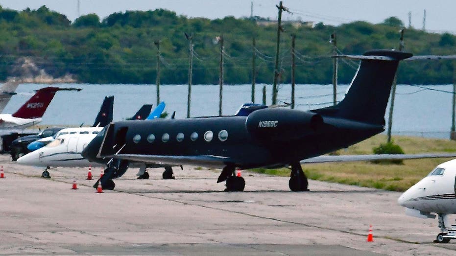 Sean "P Diddy" Combs's private jet is parked on the tarmac of an airport
