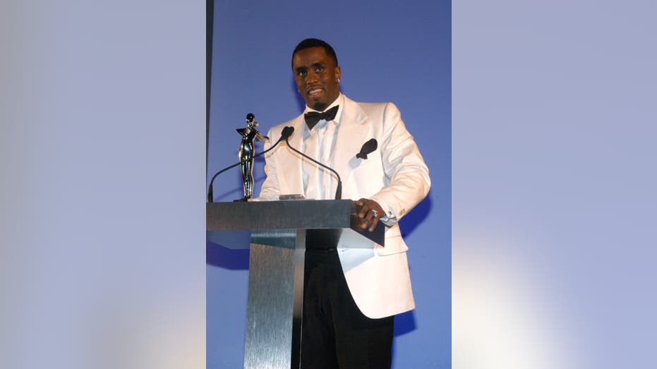 Sean "Diddy" Combs at CFDA Awards podium