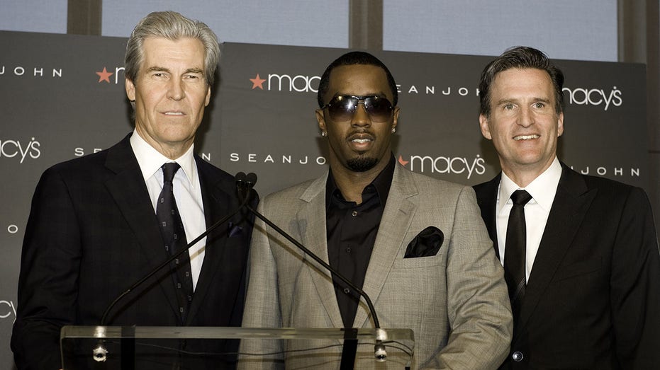Chairman, President and CEO, Macy's, Terry Lundgren, Founder of Sean John, Sean "Diddy" Combs and Chief Merchandising Officer of Macy's Jeff Gennette attend the Sean John press conference