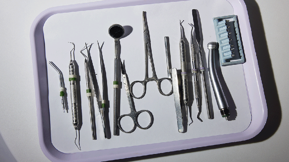 A tray of dentist tools 