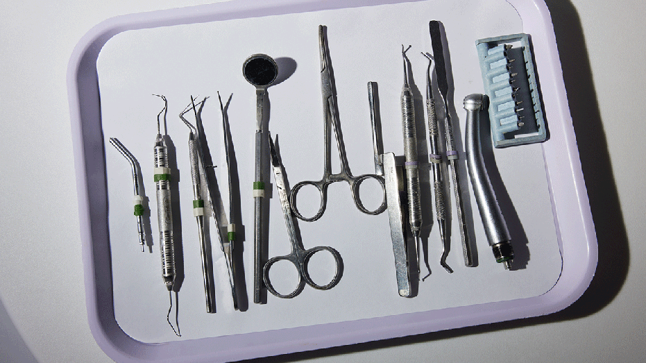 A tray of dentist tools
